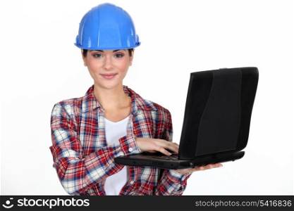 young craftswoman with laptop