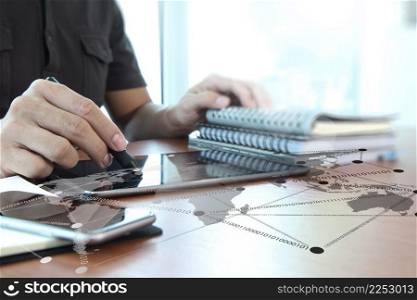 Young creative designer man working at office and social network media diagram as concept