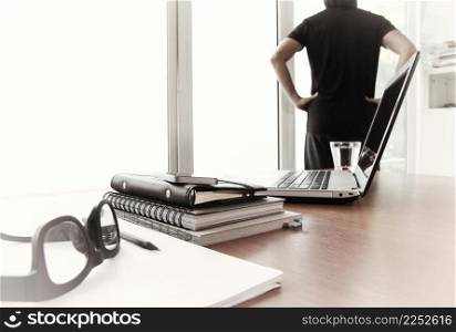 Young creative designer man working at office as concept