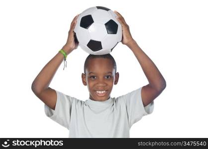 young cute boy holding a soccer ball over his head
