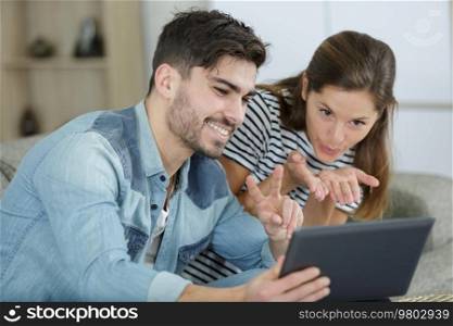 young cute couple having video chat