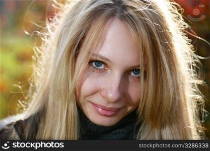 Young cute girl with long dark hairs. Fall. Autumn. Outdoor session.