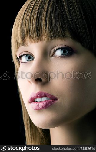 young cute woman with pink lipstick and wet lips