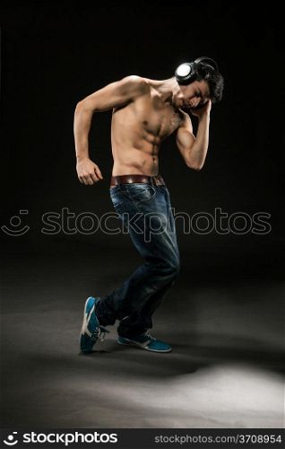 Young Dancer is wearing headphones while dancing