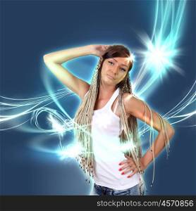 Young dancing blond woman in light flashes