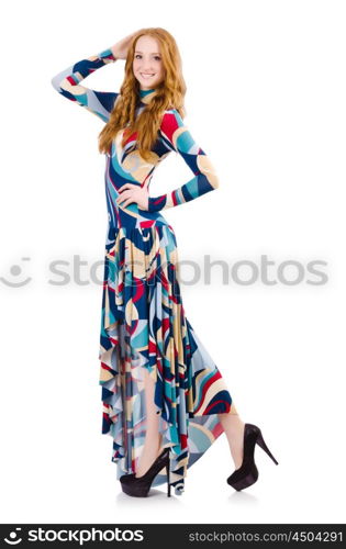 Young dancing girl in long dress isolated on white