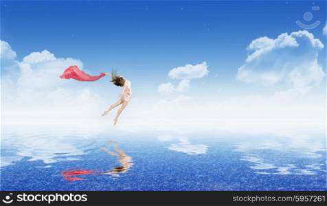 Young dancing girl on water surface