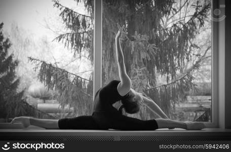 Young dancing girl on window