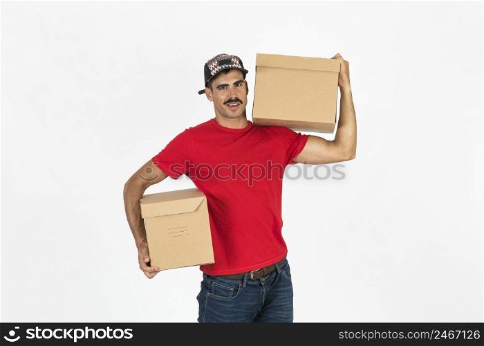 young deliveryman with boxes