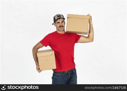 young deliveryman with boxes