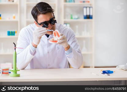 Young dentist working in the dentistry hospital