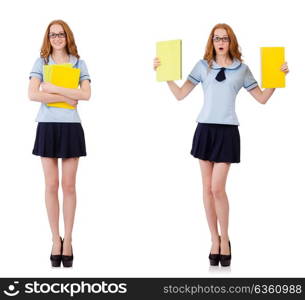 Young diligent student with textbooks isolated on white. Schoolgirl isolated on the white