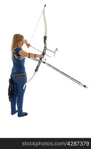 Young dirl with blue shirt and jeans shooting with a longbow