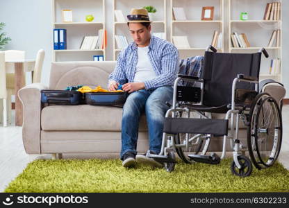 Young disabled man preparing for summer vacation