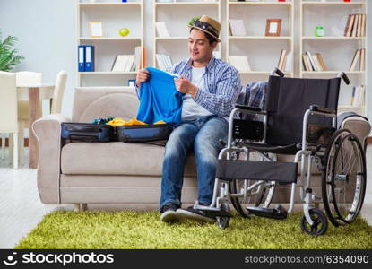 Young disabled man preparing for summer vacation