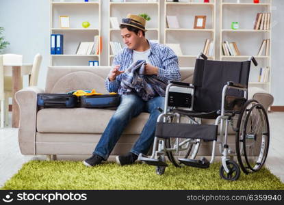 Young disabled man preparing for summer vacation