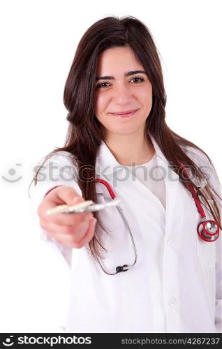 Young doctor holding some pills