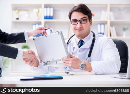 Young doctor in medical insurance fraud concept