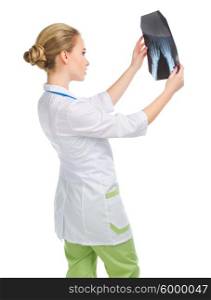 Young doctor in uniform with x-ray isolated