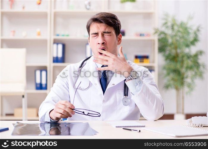 Young doctor sitting in the office