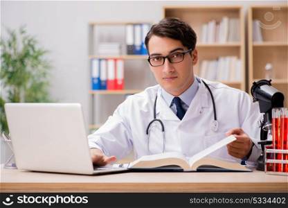 Young doctor studying medical education