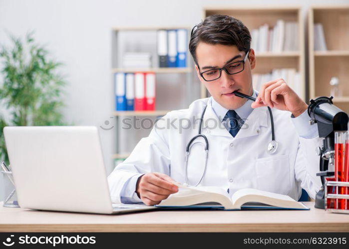 Young doctor studying medical education