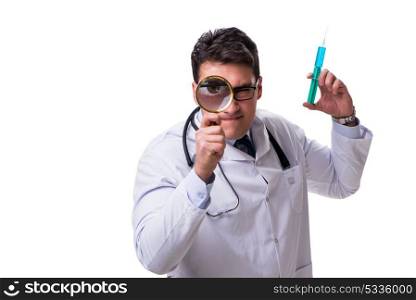 Young doctor with a magnifying glass and a syringe isolated on w. Young doctor with a magnifying glass and a syringe isolated on white background