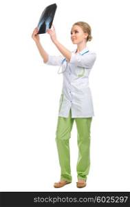 Young doctor with X-ray isolated on white