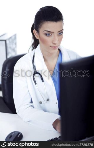 Young doctor working in the computer at her room