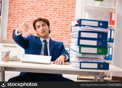 Young elegant man unhappy with too much work 