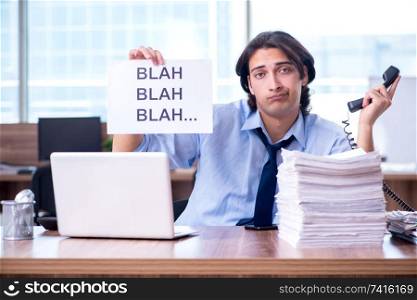 Young employee unhappy with excessive work