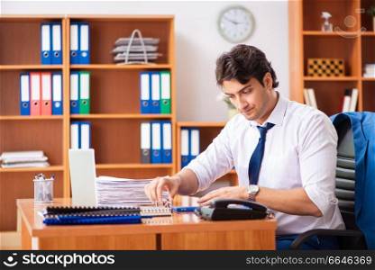 Young employee working in the office
