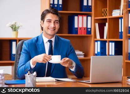 Young employee working in the office