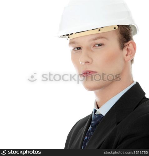 Young engineer in helmet, isolated over white
