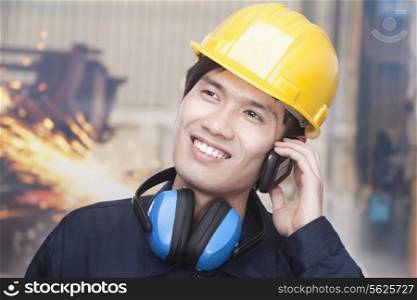 Young Engineer on the Phone
