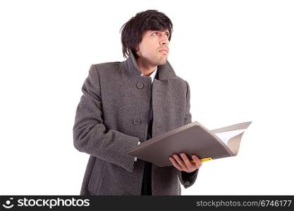 Young Engineer, reading a plan - isolated on white
