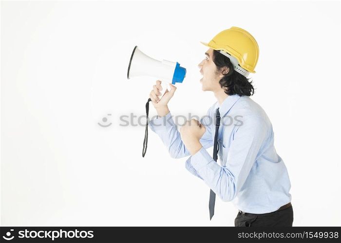 Young engineering man is announcing with megaphone