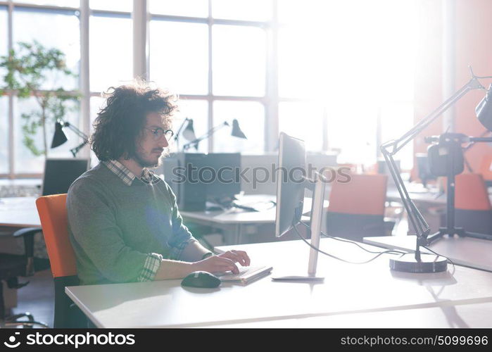 Young Entrepreneur Freelancer Working Using A computer In Coworking space