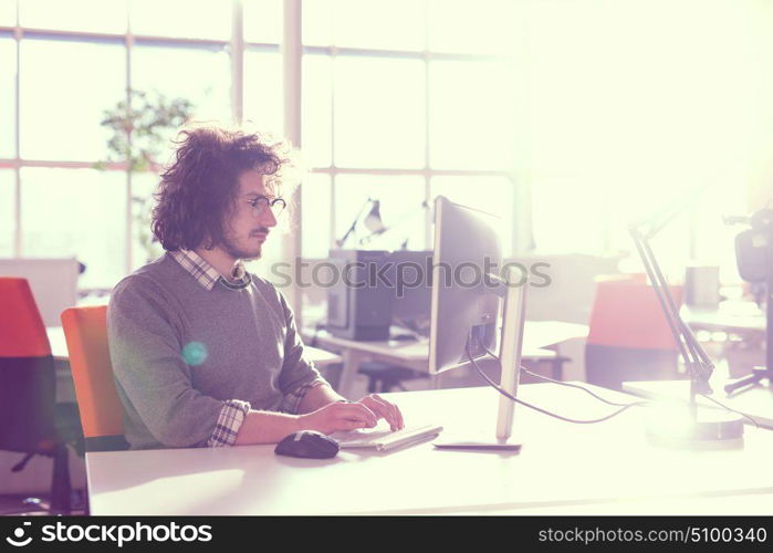 Young Entrepreneur Freelancer Working Using A computer In Coworking space