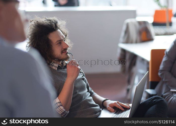 Young Entrepreneur Freelancer Working Using A Laptop And In Coworking space