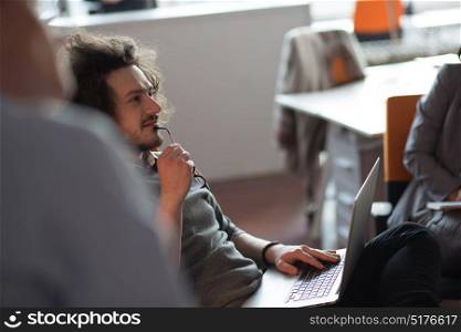 Young Entrepreneur Freelancer Working Using A Laptop And In Coworking space