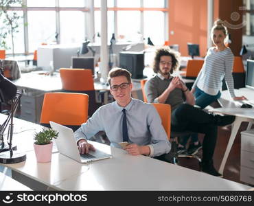 Young Entrepreneur Freelancer Working Using A Laptop In Coworking space