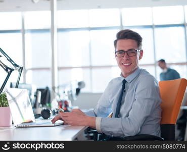 Young Entrepreneur Freelancer Working Using A Laptop In Coworking space