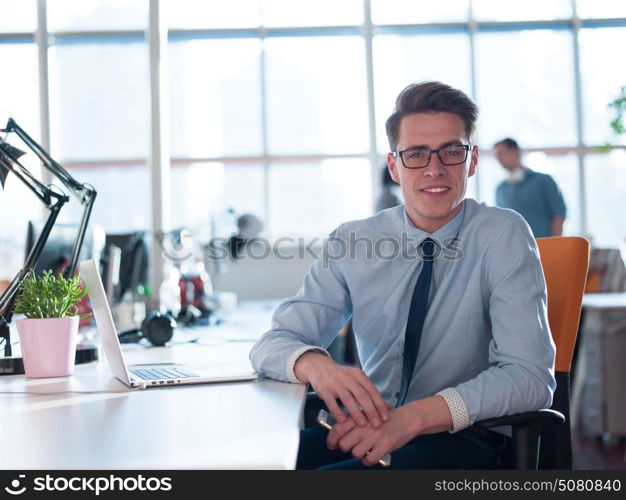 Young Entrepreneur Freelancer Working Using A Laptop In Coworking space