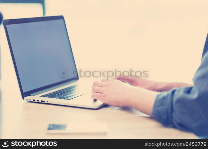 Young Entrepreneur Freelancer Working Using A Laptop In Coworking space