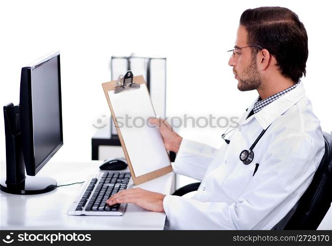 Young ethnic doctor looking at medical report deeply at his bay