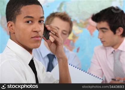 Young executive making a phone call