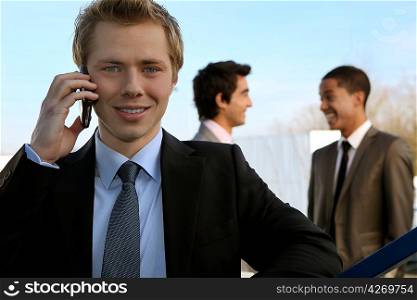 Young executive on the phone