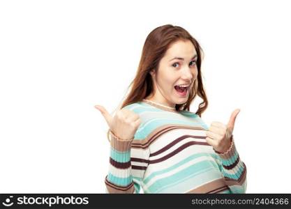 Young exited girl showing two thumbs up, isolated on white