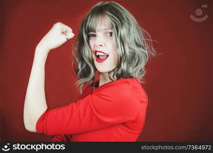 Young expressive woman in a classic feminist image